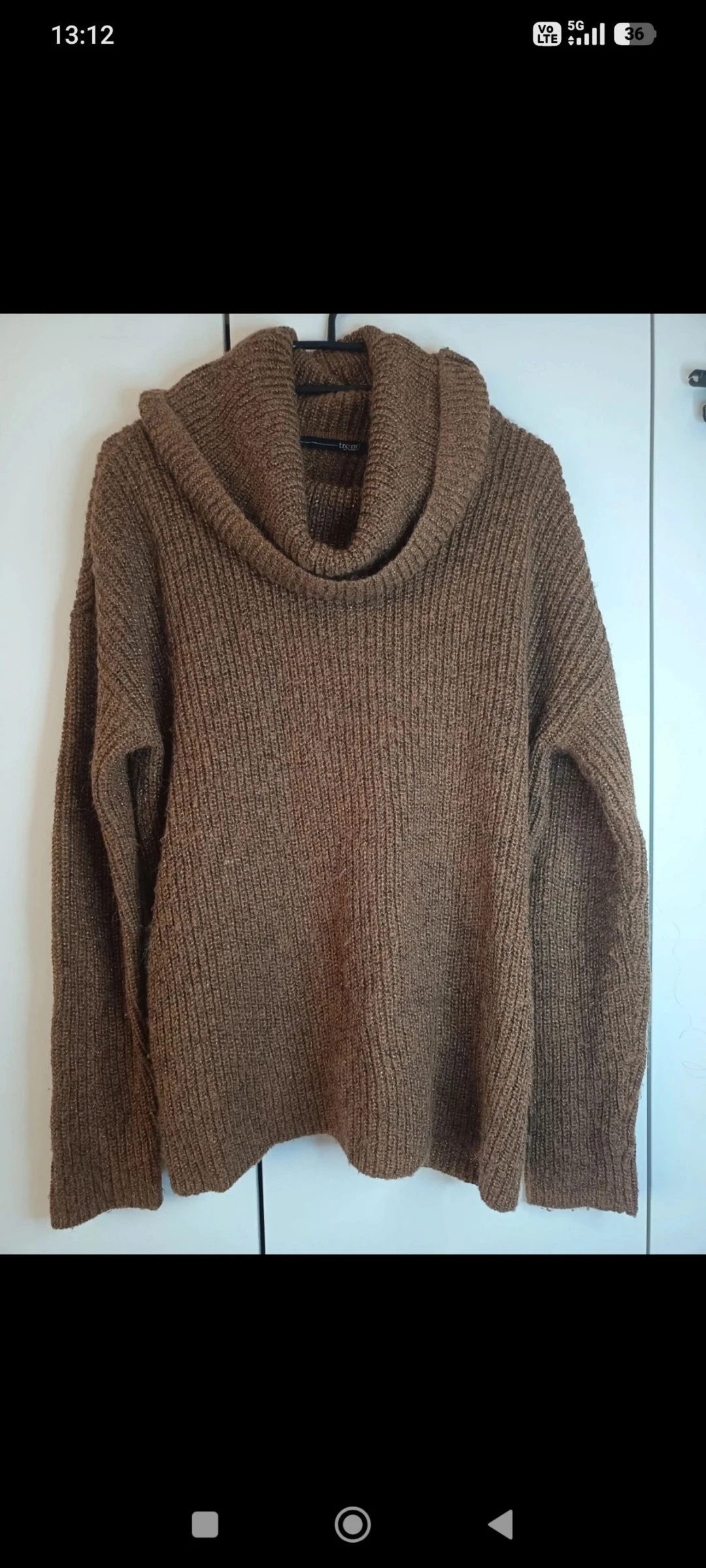 Pull pailleté dos nu 